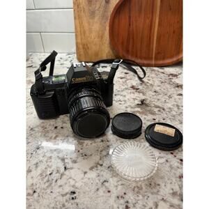 Canon T70 35mm Film Camera w/ FD 35-70mm Zoom Lens + Caps